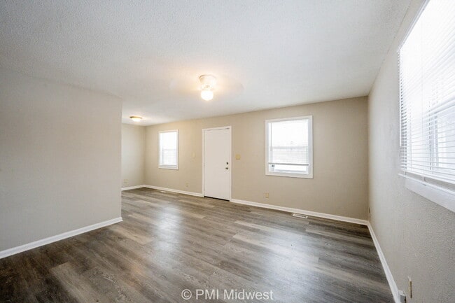 Building Photo - "Charming 3-Bedroom Gem on Udell Street with Spacious Living – 1104 Sq. Ft., Indianapolis!"