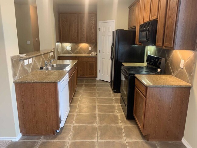Building Photo - *COMING SOON* Gated Community: 3-Bedroom with Upstairs Loft, Fenced Backyard & Prime Location!