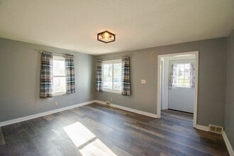 Building Photo - Fenced Yard, 2-Car Garage + Quiet Location!