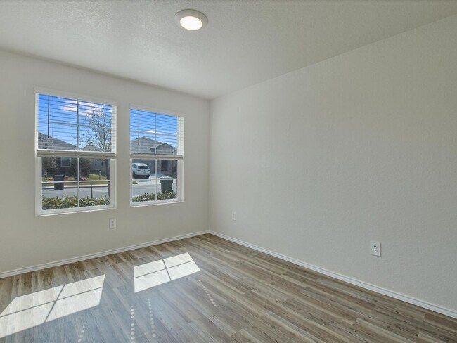 Building Photo - NEW LUXURY VINYL FLOORING IN ALL ROOMS - 3...