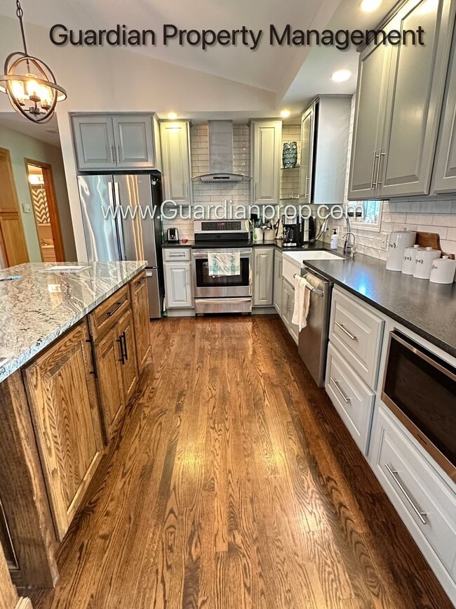 Building Photo - Maple Grove Single Family Home, Fenced Yard, 3 Car Garage, Deck, Available 7-31