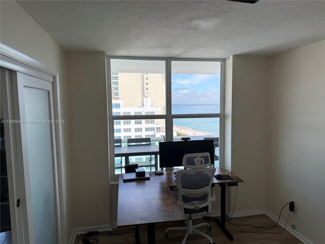 Building Photo - 5001 Collins Ave