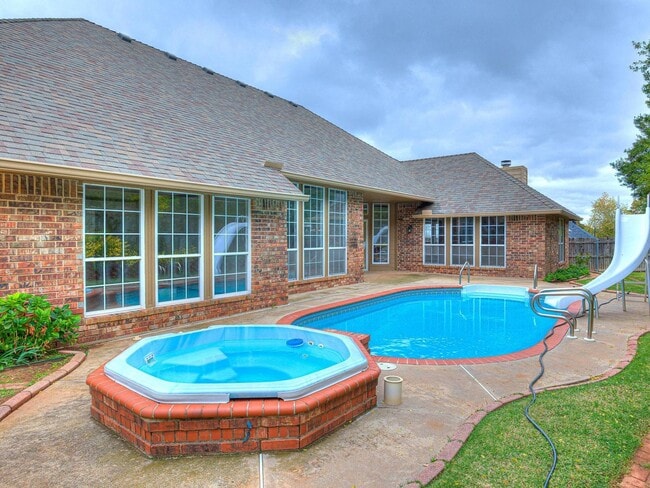 Building Photo - 4 Bedrooms - 3 Bathrooms - 3 Car Garage - ...