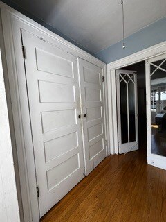Hallway, leading to sunroom/bedroom with a closet on each side - 2615 Parker St