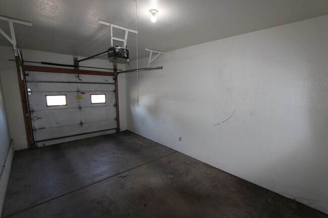 Building Photo - Bright 2BR Townhome in Boyington Heights | Private Balcony + Fenced Backyard
