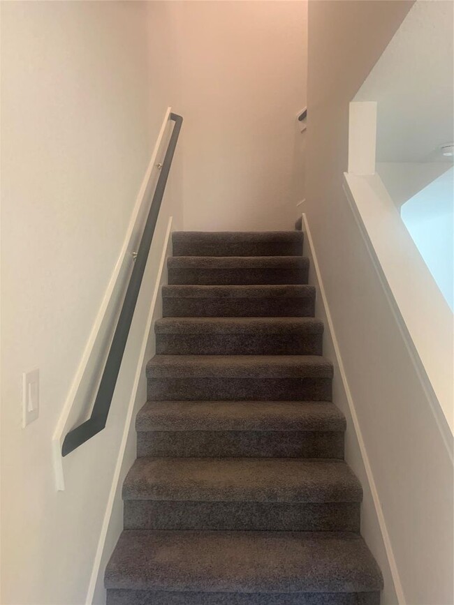 Building Photo - This home is a brand new beauty tucked bac...