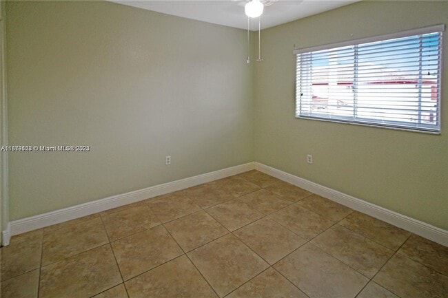 Building Photo - 10953 W Okeechobee Rd