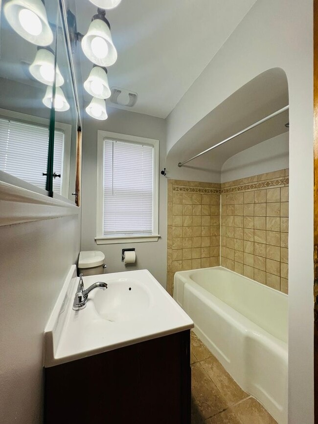 Building Photo - Elegant 4-bedroom Home with Chef’s Kitchen, 2 Full Bath, and Two-Car Garage