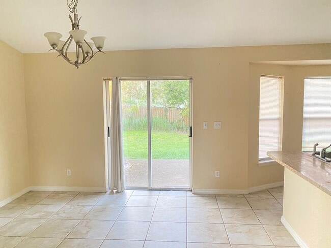 Building Photo - Tiled 3/2/2 available now!