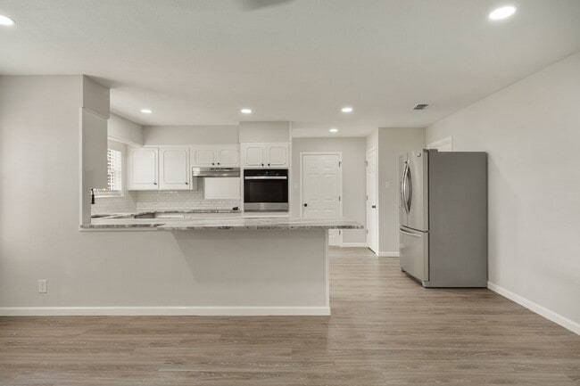 Building Photo - Completely Remodeled Four Bedroom