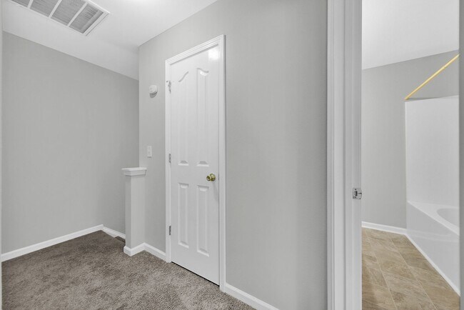 Building Photo - Two-story Condominium with Easy Highway Ac...