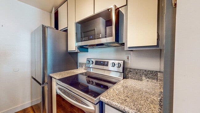 Building Photo - 2 story 2 bedroom 1 bath condo with covered parking, private storage and community pool!