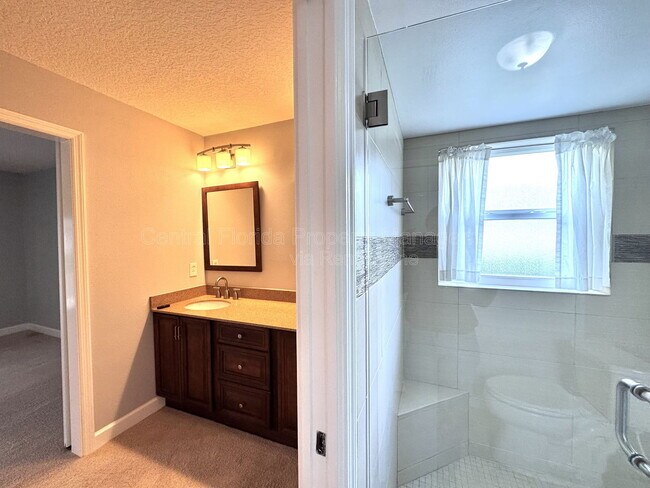 Building Photo - 4818 Breezy Palms Ct