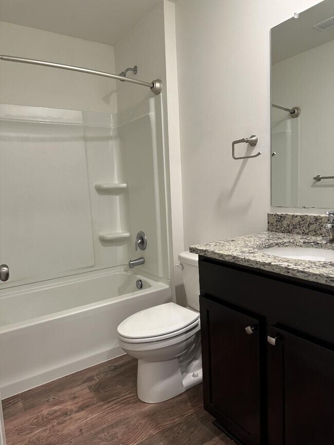 Building Photo - Modern Kitchen • Walk-In Closet • Private Primary Suite