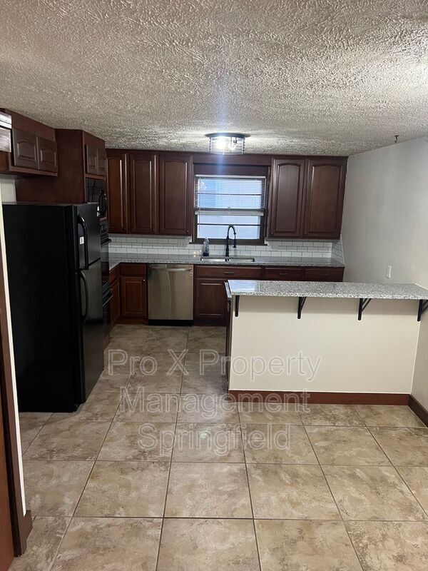 Building Photo - 3435 S Nettleton Ave
