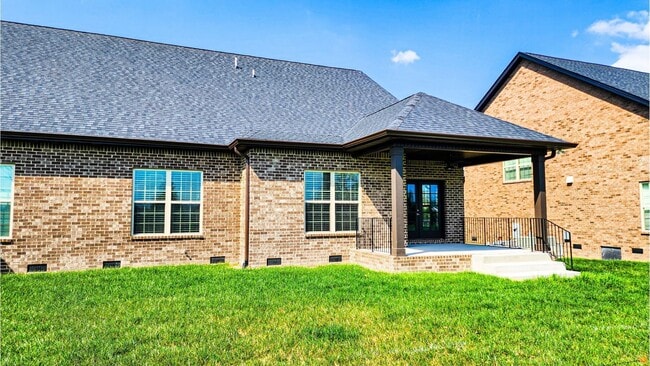 Building Photo - Elegant All-Brick Townhome in a Gated Comm...