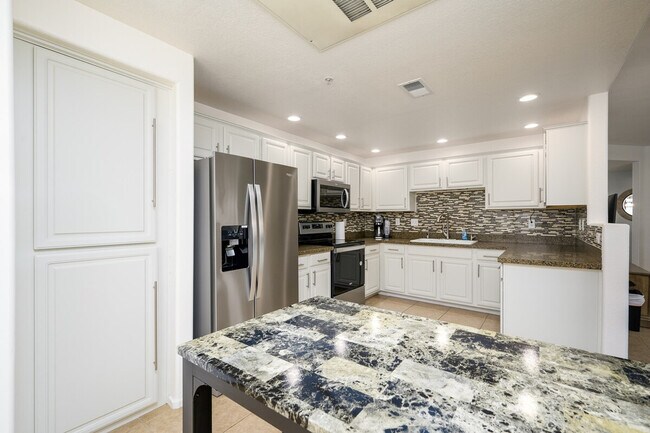 Building Photo - 9455 E Raintree Dr