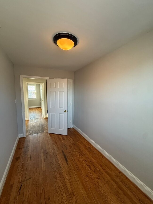Building Photo - End Unit 3BR Townhome in Dundalk | Fresh Paint, Refinished Hardwood Floors, Fenced Yard, Off-Stre...