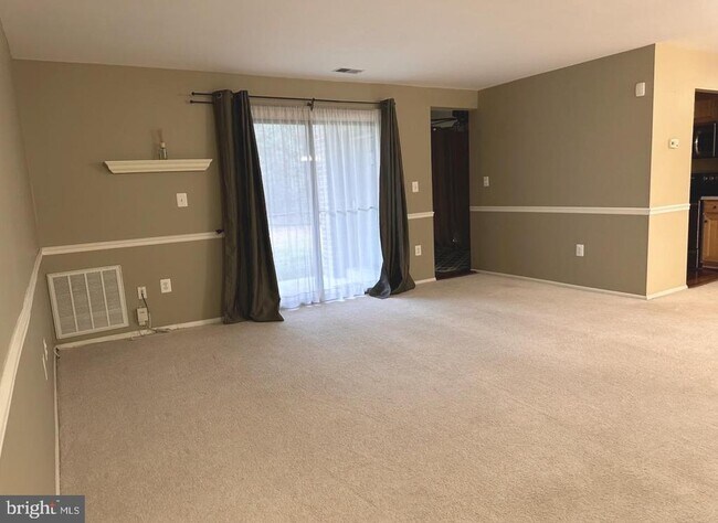 Building Photo - 8141 Needwood Rd