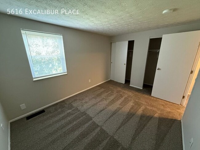 Building Photo - 5616 Excalibur Pl