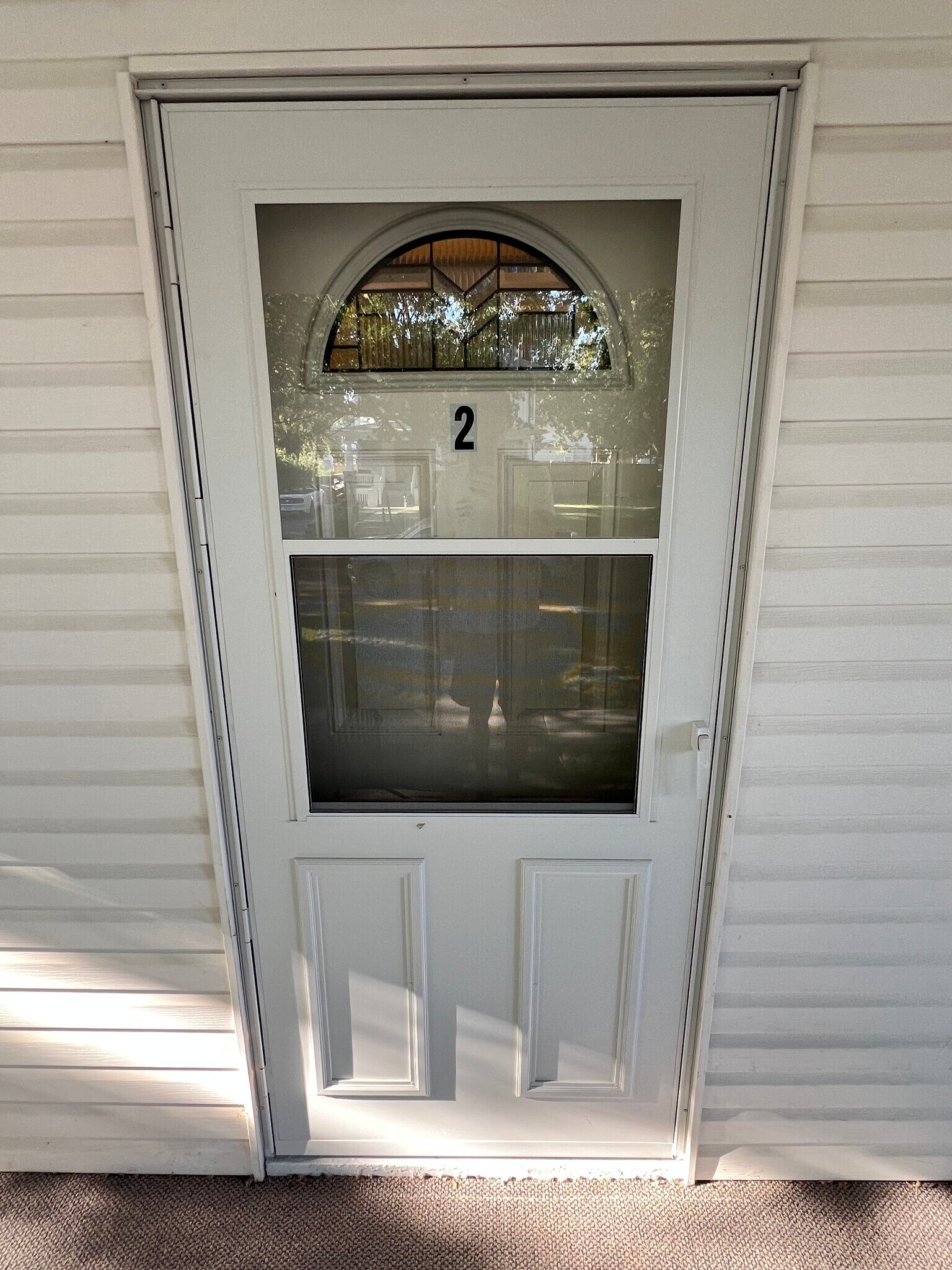 New storm door - 3260 Starr St