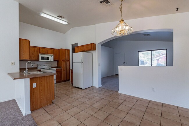 Building Photo - Three bedrooms! Fresh Carpet and Paint!