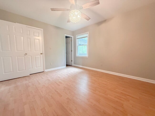 Building Photo - Spacious 3-Bedroom Home with Screened Porch, 2-Car Garage + Workshop