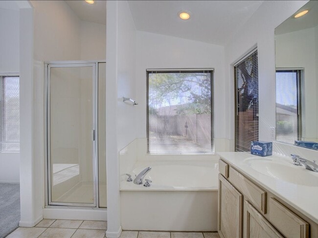 Building Photo - Spacious Living in a Gated Community with Resort-Style Amenities!