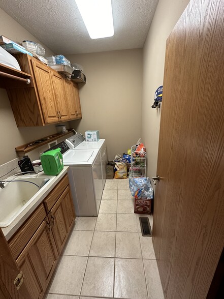 washer/dryer in storage room - 5800 S 77th St