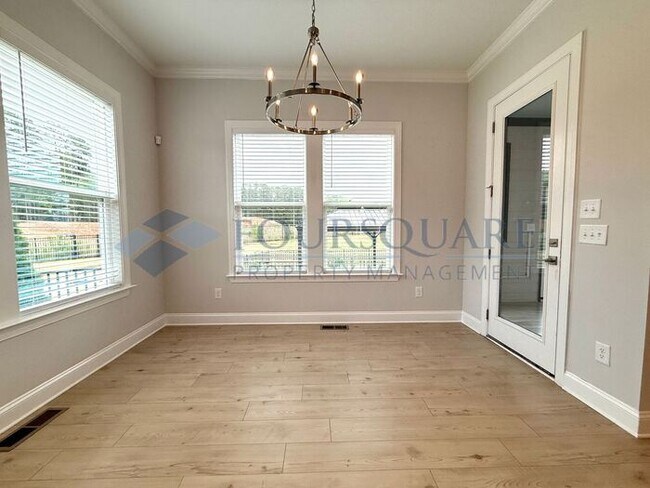 Building Photo - Elegant 4-Bed / 3.5-Bath Home with Main-Level Primary Suite, Quartz Kitchen & 3-Car Garage – In H...