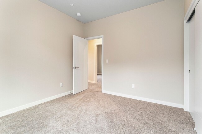 Building Photo - 2022 Build -Almost Brand New 3 br 2.5 bth Home with hardwoods, fenced yard and backs to greenspace !