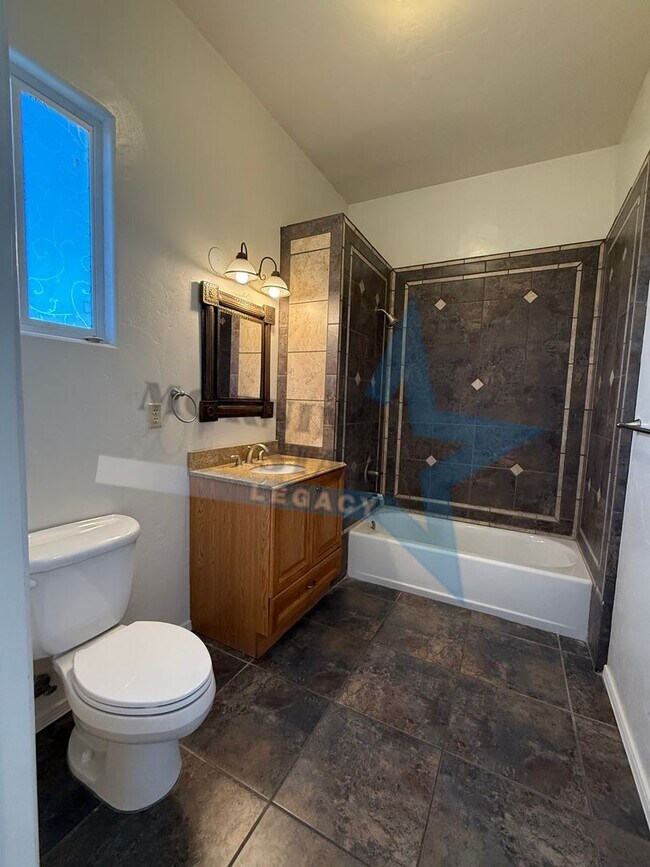 Building Photo - 4 bedroom, 4 bath house - Must see landscaping!