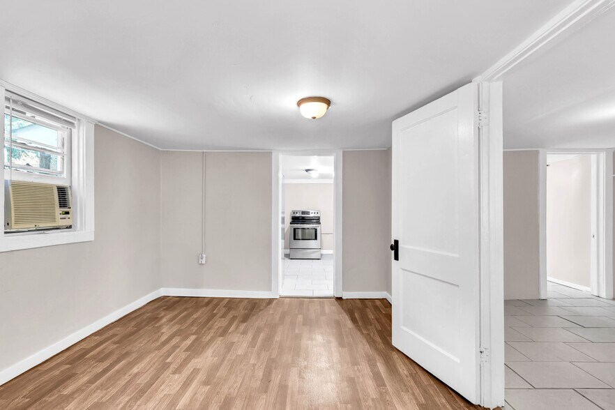 Living room perfect for entertaining and relaxing after a long day. - 1 Proctor Dr