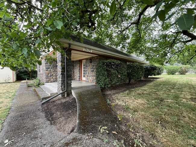 Building Photo - Historic 4-Bedroom Stone Home with Timeless Character, Hardwood Floors, Spacious Living & a Large...