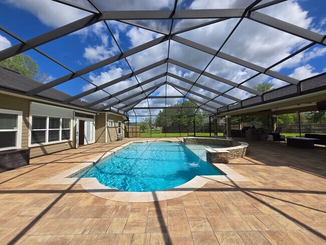 Building Photo - Gorgeous 4-Bedroom Home with Office, Pool,...