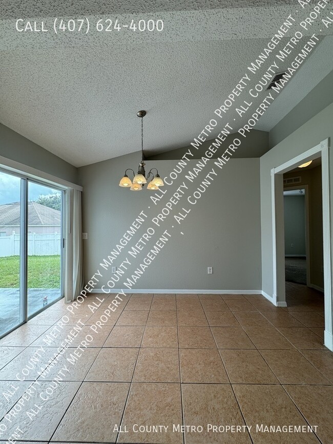 Building Photo - 3 Bedroom Poinciana Gem!