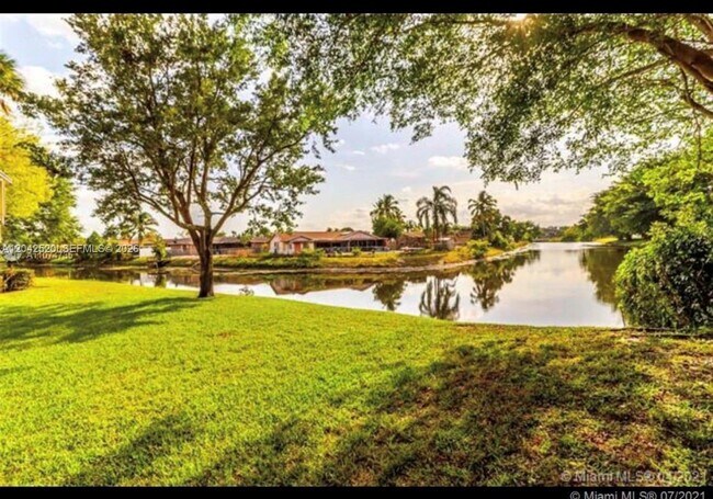 Building Photo - 3833 Cocoplum Cir