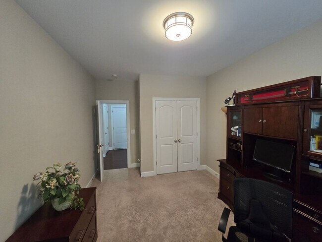 Building Photo - Spacious 4BR + Bonus, 4.5BA Home with 3-Car Garage in Brightleaf at the Park