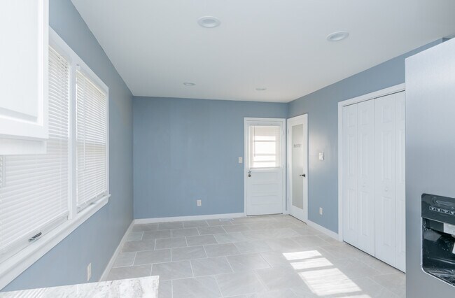 Building Photo - 7204 Woolrich Rd