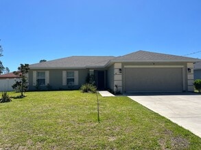 Building Photo - Newer Home with Fenced in Yard!!