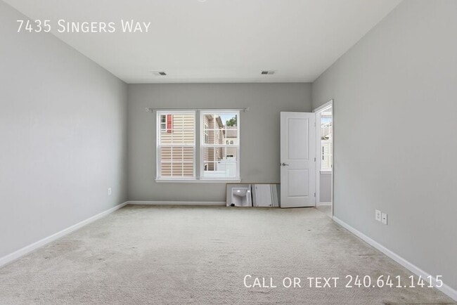 Building Photo - 7435 Singers Way