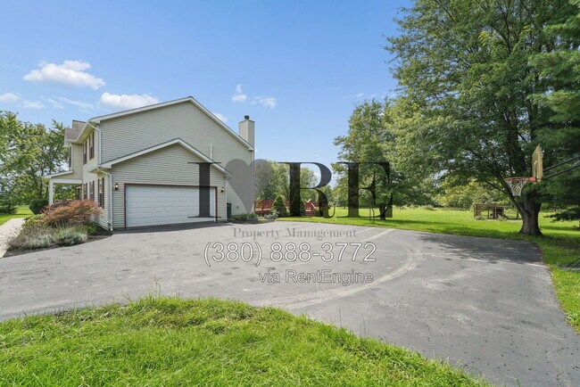 Building Photo - 8765 Hyland-Croy Rd