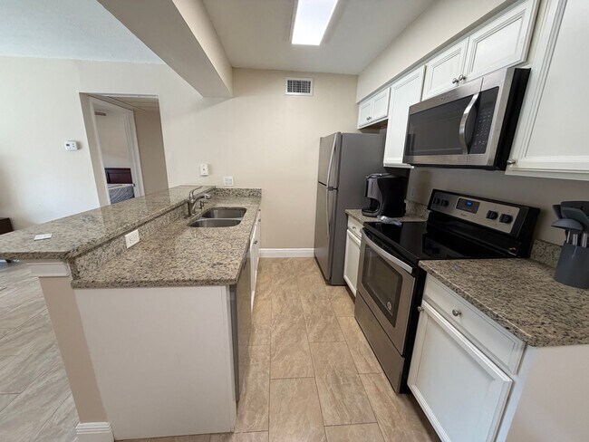 Building Photo - ANNUAL RENTAL - FURNISHED 1 BED / 1 BATH CONDO AT MYSTIC GARDEN