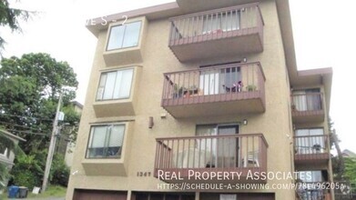 Building Photo - Charming 1 bedroom  *GARAGE PARKING* SECUR...