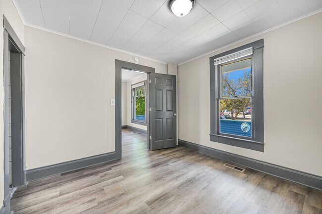 Building Photo - One Month FREE & FREE 50 inch Flat Screen ...