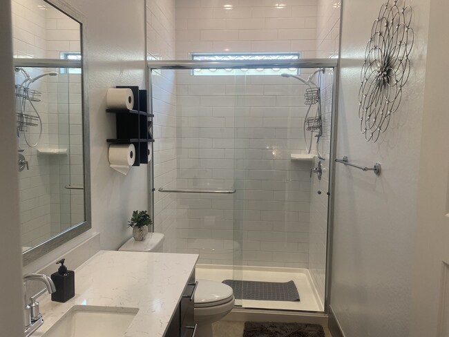 Clean, crisp tiled shower - 19848 W Monterosa St