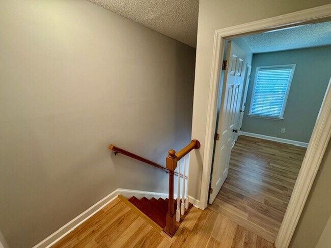 Building Photo - Elegant 2-Story Townhome with Sunroom & Luxury ensuite!