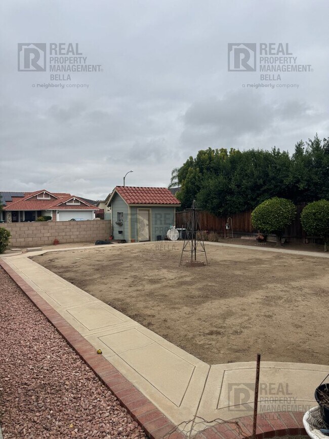 Building Photo - Corner-Lot Charmer with Open Layout and Sp...