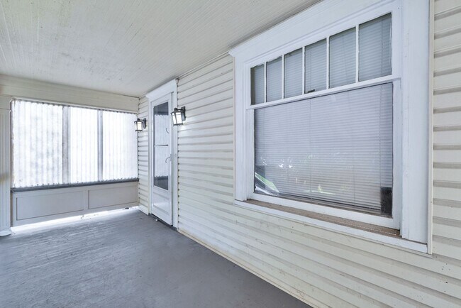 Building Photo - Charming 3BR Home with Classic Woodwork, Porch & Bonus Attic Space