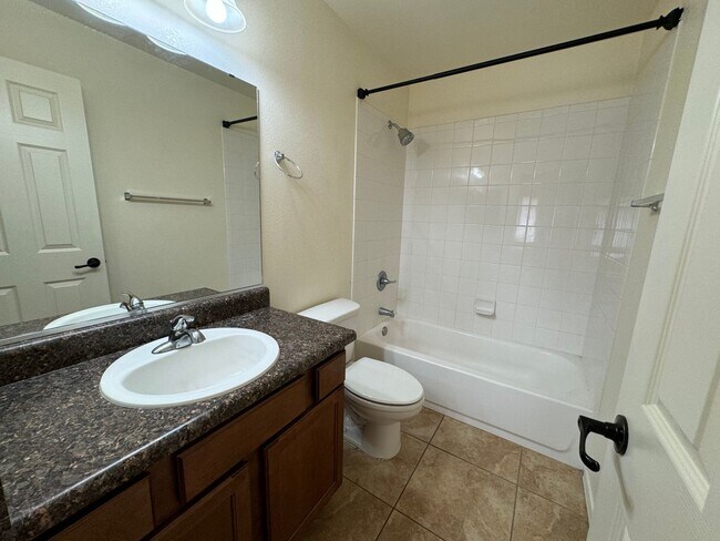 Building Photo - 4BR/2BA/2CG, TESLA CHARGER 1765 sq.ft. ren...